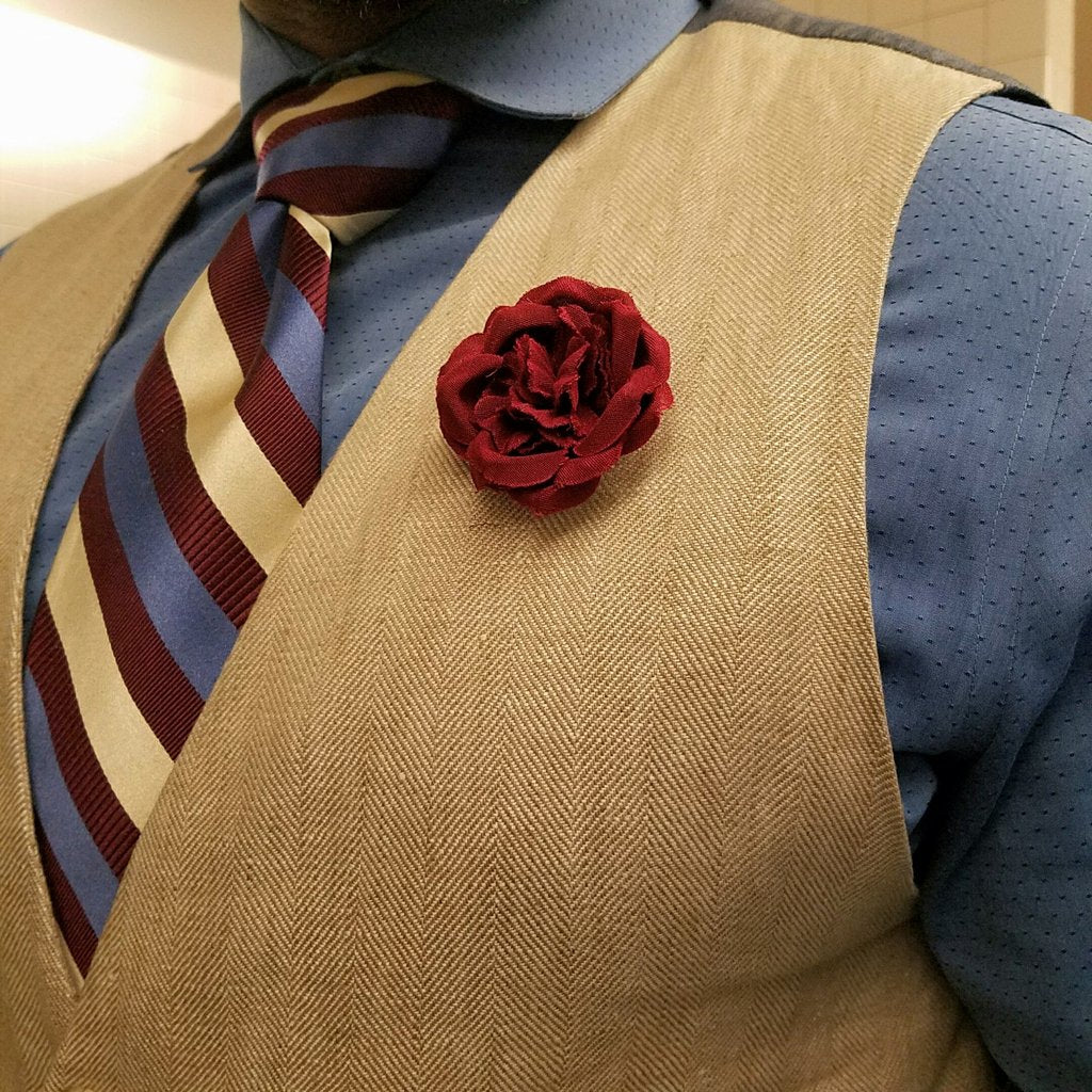 Fabric lapel pin. Small buttonhole pin. Blue, beige, red.